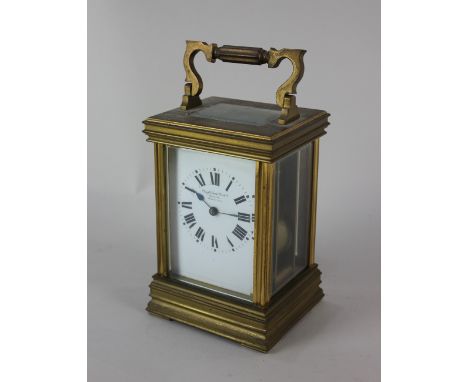 A French brass carriage clock the white enamel dial with Roman numerals inscribed 'Anglo Swiss Watch Co Calcutta', striking o