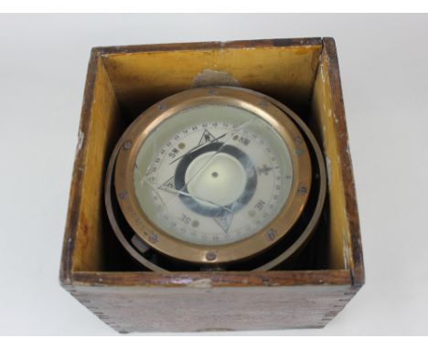 A marine gimballed compass stamped PATT 0183 No C 855, in part wooden case (a/f - cracked)