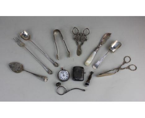 An Edward VII silver caddy spoon and a collection of assorted silver servers to include a pair of pickle fork and spoon, 800 