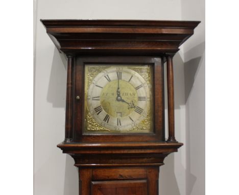 A George III oak and mahogany banded longcase clock the 10 inch dial inscribed 'John Bullock, Bps Waltham' with engraved bird