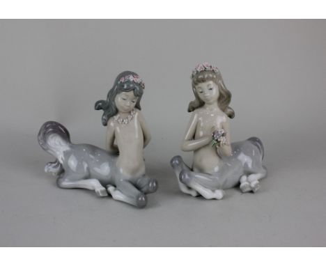 A pair of Lladro porcelain child centaur figures with flowers in their hair 14cm high