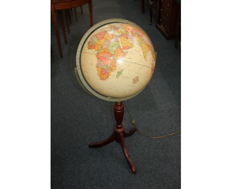 A modern light-up globe 'The Classica from Cram Herff-Jones Education Division', on mahogany tripod stand approx 95cm high
