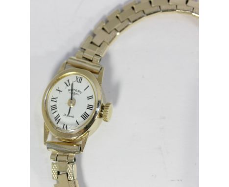 A Rotary 9ct gold lady's wristwatch oval dial with Roman numerals, gold plated bracelet strap