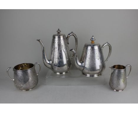 A Victorian silver matched four-piece tea and coffee set to include a teapot, coffee pot, cream jug and sugar bowl, tapered f