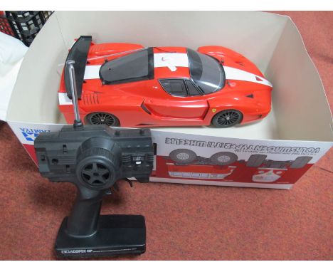 A Tamiya 1/10th Scale R/C Ferrari FXX Car with Controller, fair condition, components not checked for completeness, viewing r