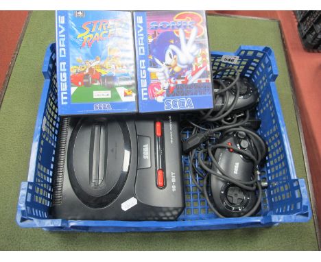 A Sega Mega Drive II 16 Bit Gaming Console, two controllers, Sonic 3 and Street Race gaming cartridges, (untested sold for pa