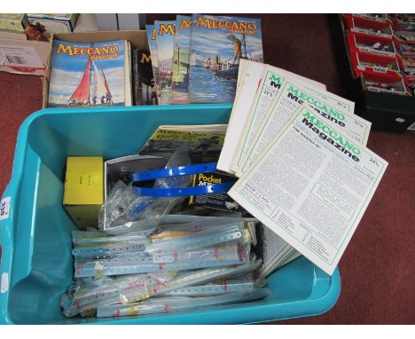 A Quantity of Meccano Components, to include tyres, cogs, strips, plates, sometimes within original unopened packaging; toget