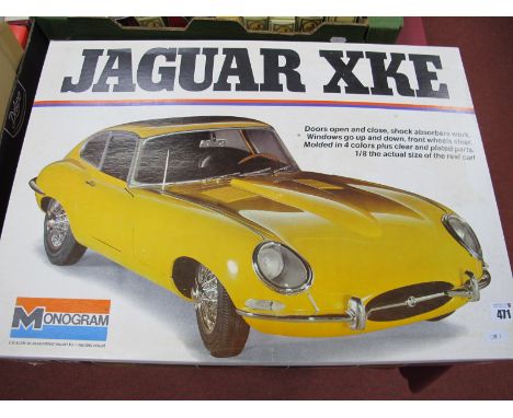 A Monogram 1/18th Scale #2601 Jaguar XKE Plastic Model Kit, buyer to assure themselves for completeness of all parts, boxed.