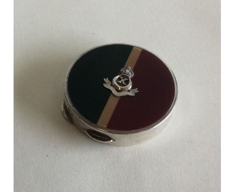 A heavy silver and enamelled Regimental compact. Retailed by Paige of Plymouth. Birmingham 1923. Approx. 44 grams. Est. £80 -