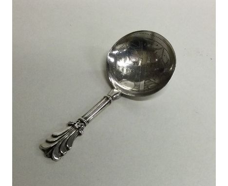 A Victorian silver caddy spoon with engraved bowl. Birmingham. By George Unite. Approx. 7 grams. Est. £50 - £80.