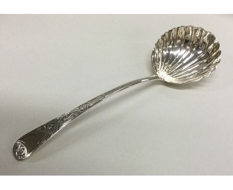 A George III silver sauce ladle with fluted bowl. London 1808. By John Blades. Approx. 36 grams. Est. £30 - £40.