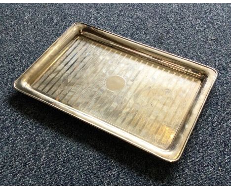 A heavy engine turned silver tray. Birmingham by SB. Approx. 500 grams. Est. £150 - £200.