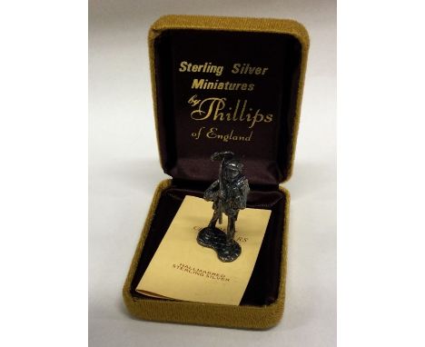 A novelty miniature silver figure of a chimney sweep contained within original box. Approx. 30 grams. Est. £30 - £40.