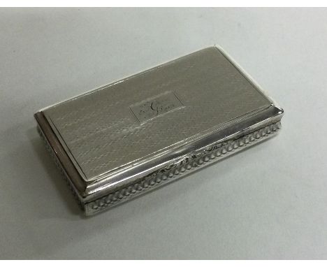 A good large engine turned silver snuff box with gilt interior. Birmingham. By Nathaniel Mills. Approx. 36 grams. Est. £300 -