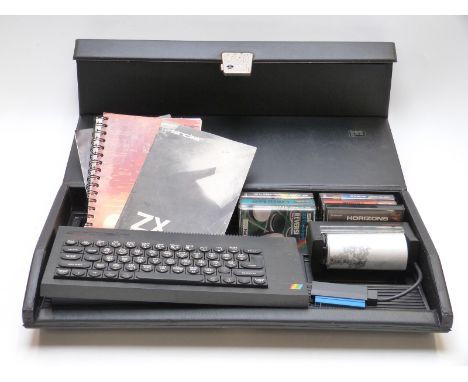 Sinclair ZX Spectrum vintage personal computer together with various games and a ZX Printer, in carry case.&nbsp;