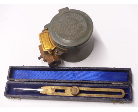 A cased set of military brass dividers and a Horstmann engineering gas lamp or similar timer