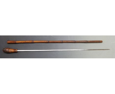 An early 20thC bamboo swordstick with 75cm graduated steel blade, overall length 88cm.&nbsp;
