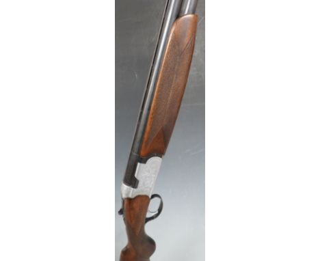 Beretta S56E 12 bore over under ejector shotgun with single selective trigger, named and engraved locks, engraved underside ,