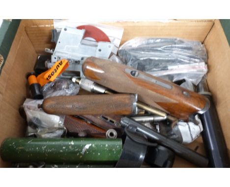 A collection of gun parts and accessories including forends, sound moderators, magazines, springs, ladder sights, etc.&nbsp;P