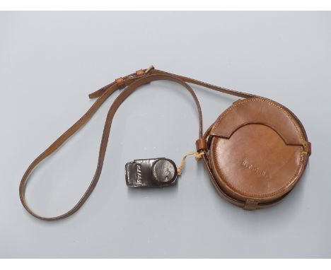 WWII military marked leather film holder marked Timbers 1940 and R.F.G.R. and a light meter, suitable for re-enactment