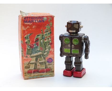 Japanese battery operated tinplate Attacking Martian robot, in original box.&nbsp;&nbsp;