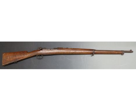 Deactivated Mauser 7.92mm bolt action rifle with ladder sight, sling suspension mounts, steel butt plate, stock engraved R Pa