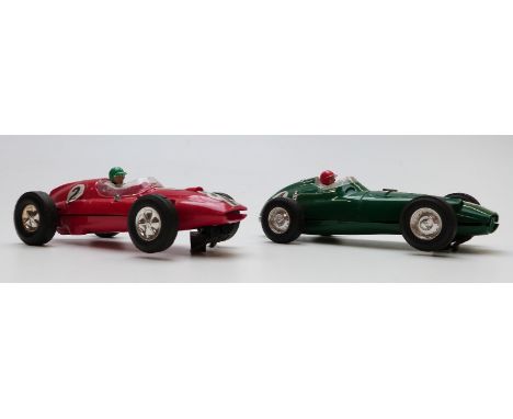 Two Tri-ang Scalextric model motor racing/ slot racing cars Cooper with red body, chrome hubs, white driver with green hat an