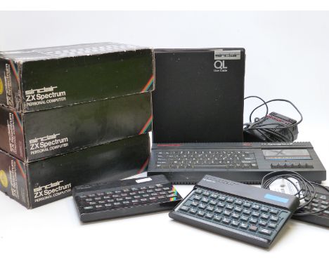 Three Sinclair ZX Spectrum vintage personal computers all in original boxes together together with a Sinclair ZX Spectrum +2 