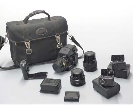 Bronica ETRS medium format SLR camera with Zenzanon 1:2.8 50mm, 1:2.8 75mm and 1:3.5 150mm lenses, two 120 film backs, prism 