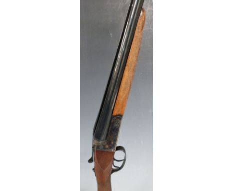 Laurona 20 bore side by side shotgun with engraved locks, double trigger, chequered grip and forend and named 27.5 inch barre