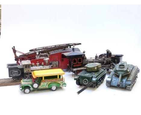Six tinplate model vehicles comprising two tanks, a fire engine, two trains and a Philippine Jeepney