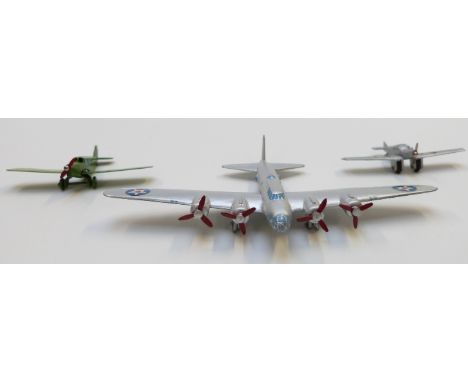 Three Meccano Dinky and Schuco diecast model aeroplanes comprising Long Range Bomber, Light Tourer and Junkers F13 335 779&nb