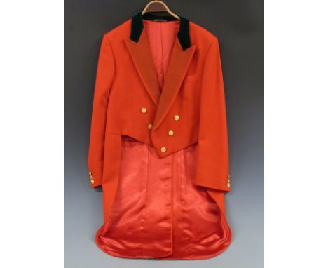 A hunting coat with tails, monogrammed CD buttons and green velvet collar, possibly for the Cotley Harriers Hunt, Devon