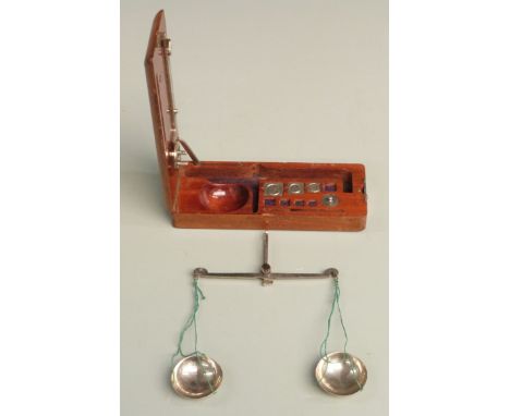 19th / early 20thC wooden cased diamond scales with carat weights. Length of box 16cm