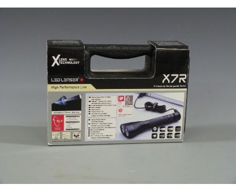 LED Lenser X7R professional rechargeable torch/ light, new in original hard carry case.&nbsp;
