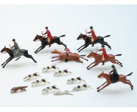 Britains lead model hunting set compromising six huntsmen and women and horses, eight hounds and a fox&nbsp;