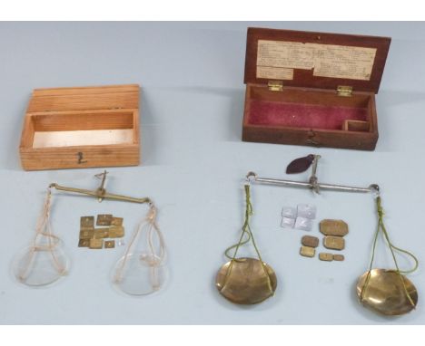 Two sets of 19thC travelling beam scales, one with list of weights to interior of lid. Width of case 18cm