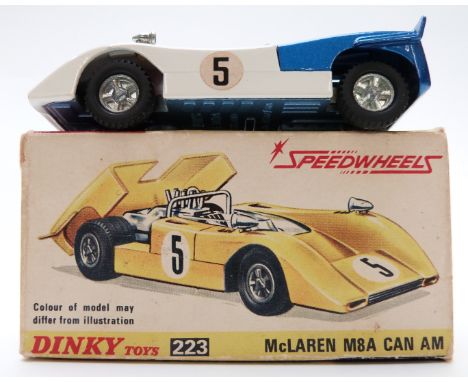 Dinky Toys Speedwheels diecast model McLaren M8A Can Am with white body, blue engine cover, red interior and racing number 5 