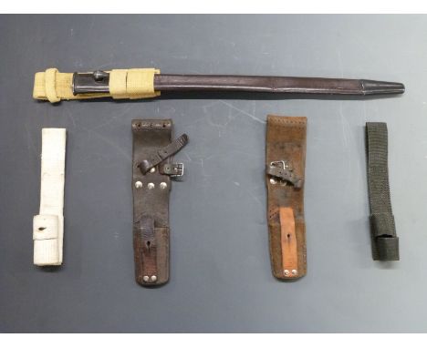 Five assorted bayonet frogs and one scabbard&nbsp;