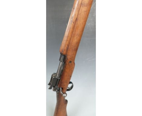 Lee Enfield bolt action .303 rifle converted to a .410 shotgun with pop-up ladder sights, sling suspension mounts and 26.75 i