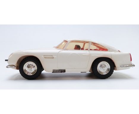 Tri-ang Scalextric model motor racing/ slot car James Bond Aston Martin with white body, red interior, chrome bumpers and hub