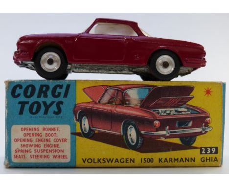 Corgi Toys dicast model Volkswagen 1500 Karmann Ghia with maroon body and yellow interior 239, in original box.&nbsp;