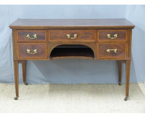 A late 19th/early 20thC desk with five drawers and central shelf, having inlaid and cross banded decoration, W122 x D61 x H78