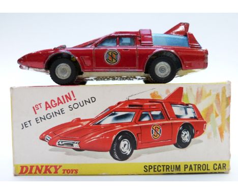 Dinky Toys diecast model Captain Scarlet Spectrum Patrol Car with turbo-jet engine sound, suspension, red body, yellow interi