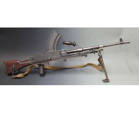 Deactivated Bren MKII .303 light machine gun with wooden stock stamped S.III, pistol grip, canvas sling, ladder sight, frame 