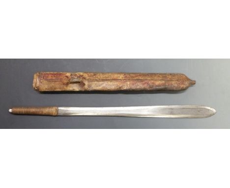 A tribal machete with leather covered wooden scabbard, blade length 40cm