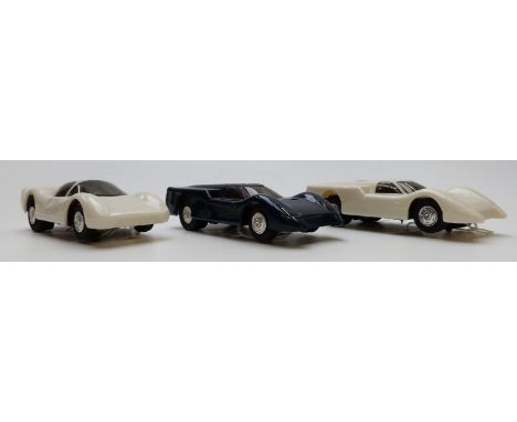 Three Eldon model motor racing/ slot car Le Mans style racing cars two Ford J 1350-14 and one Ferrari P-3 1350-15.&nbsp;