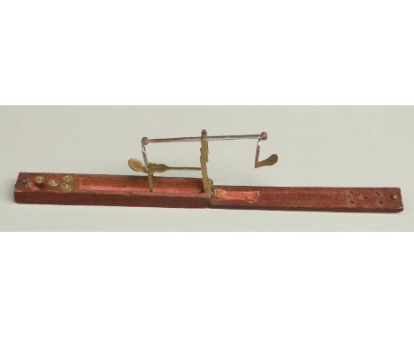 Georgian mahogany cased folding guinea or sovereign scale and weights, one marked C Ward