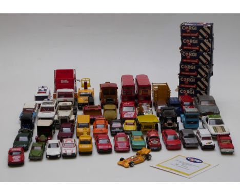 Fifty Corgi, Dinky, Matchbox and similar diecast model vehicles, some in original boxes