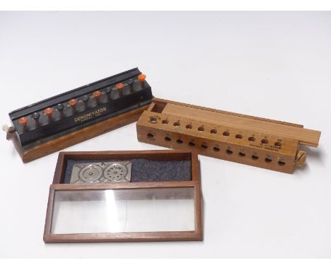 Three vintage calculators, one a Denominator, length 26cm, another marked as being made in occupied Japan and the other marke
